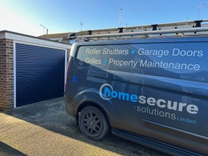 blue roller shutter with Home Secure van in Essex