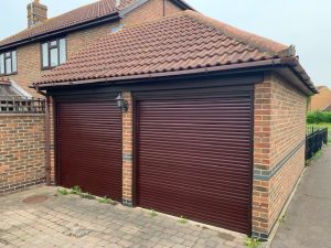 brown double roller shutter garage doors