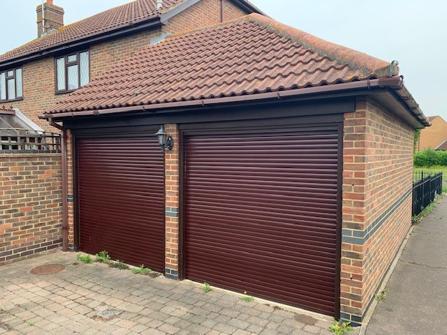 brown double roller shutter garage doors